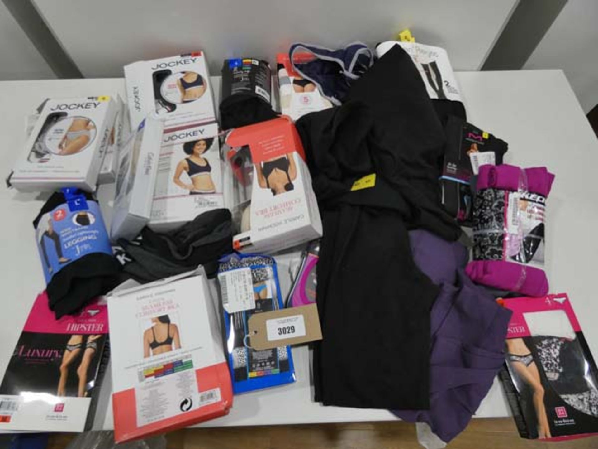 Bag of ladies sports bras, briefs and leggings in various sizes and colours to include Jockey