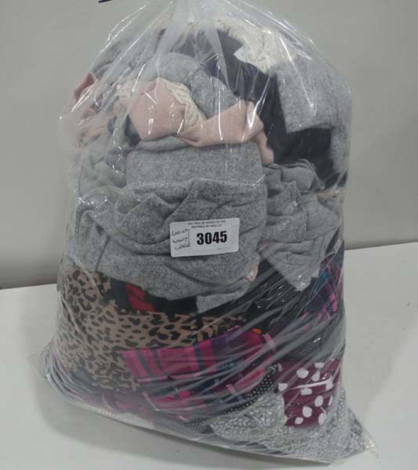 Large bag containing ladies loungewear in various sizes and colours including DKNY