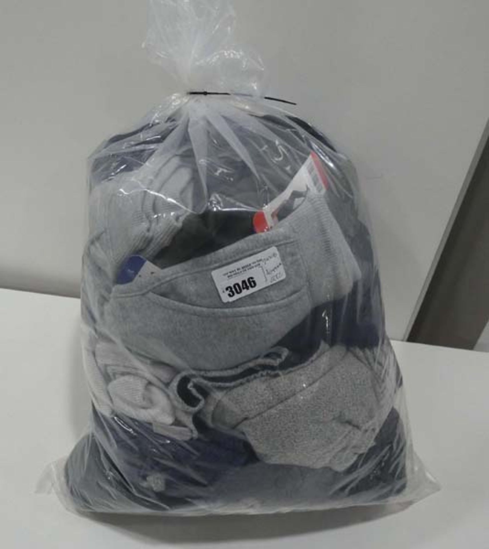 Large bag of mens jogging wear including tracksuit bottoms and tops in various colours and sizes