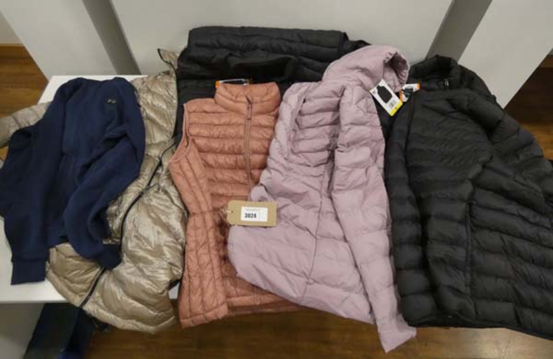 Bag of mixed ladies and mens hooded coats and gilets in various colours and sizes, brands to include