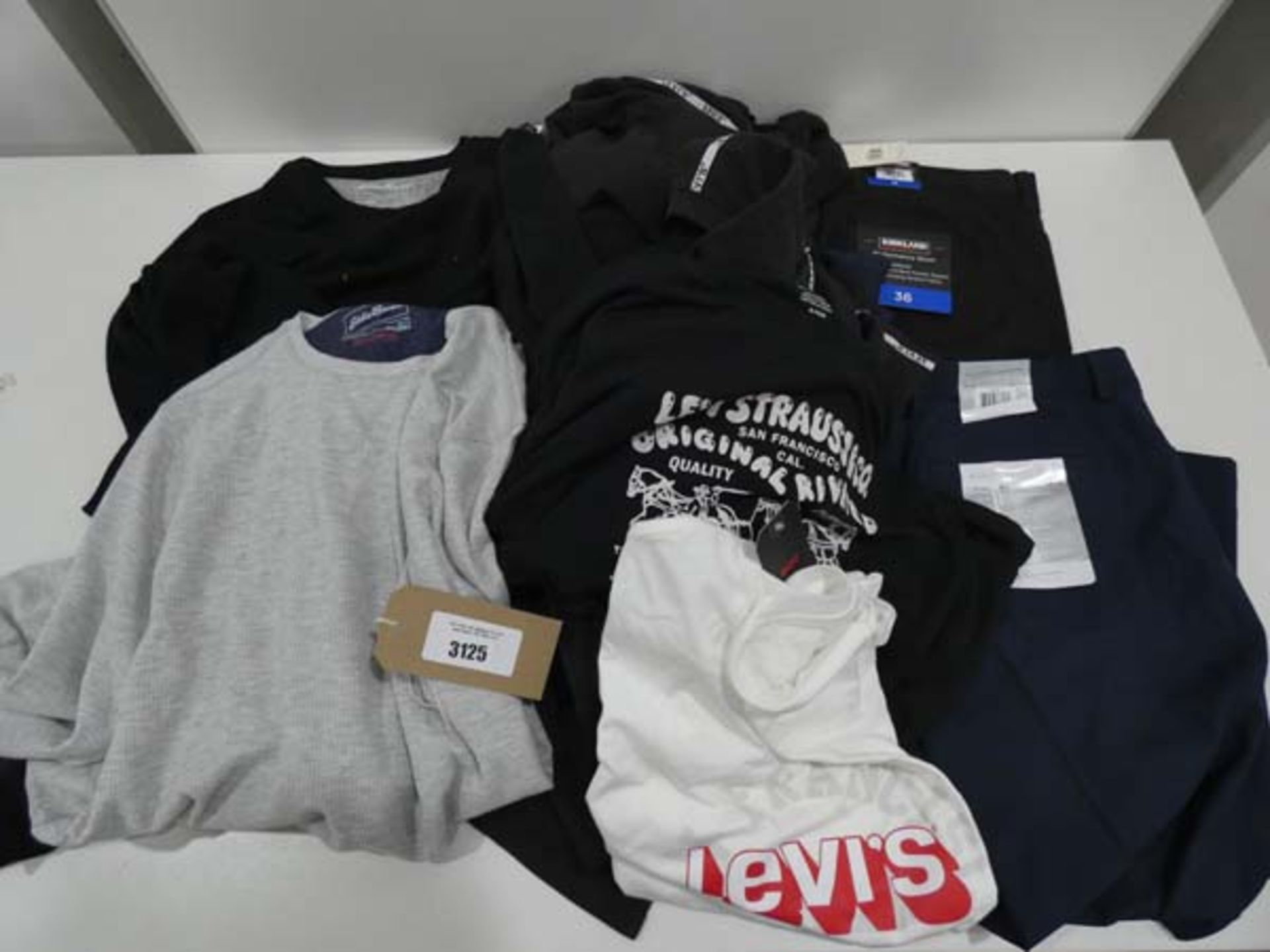 Bag containing men's tops, trousers, shorts, including Greg Norman and Levis in various sizes and