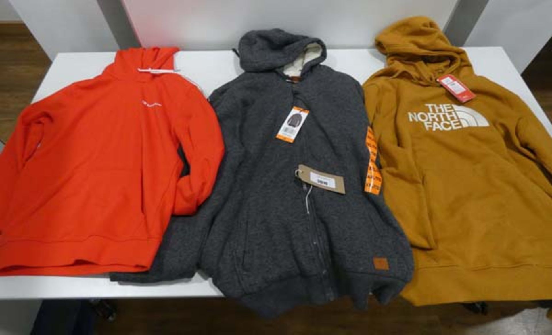 3 hoodies to include North Face XL tan hoodie, Buffalo dark grey XXL hoodie and Champion red