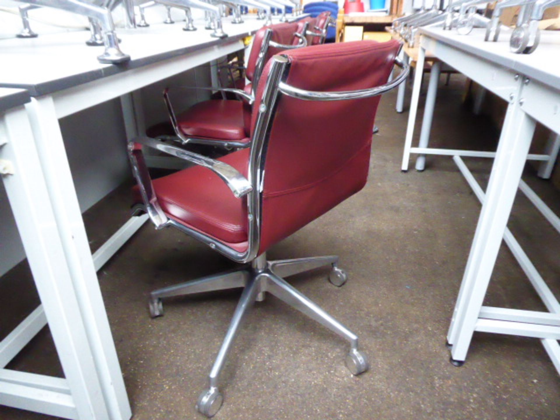 6 Milani Charles Eames style soft pad swivel armchairs in burgundy leather with higher lift action - Image 2 of 3