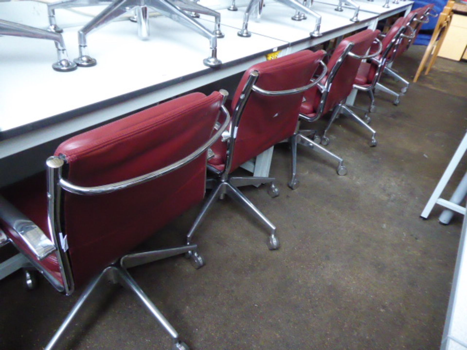 6 Milani Charles Eames style soft pad swivel armchairs in burgundy leather with higher lift action - Image 3 of 3