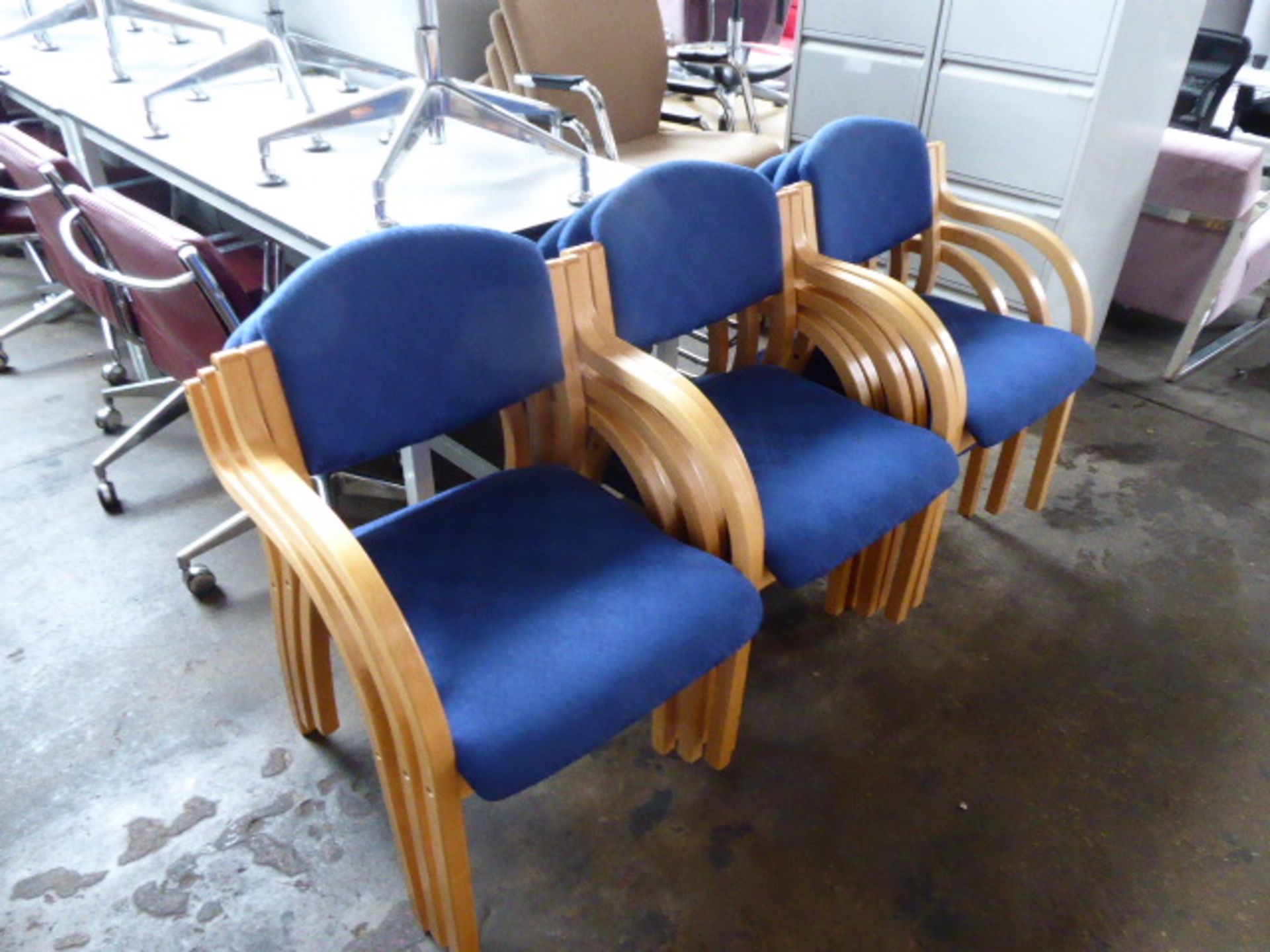 9 bent wood and blue cloth stacking chairs