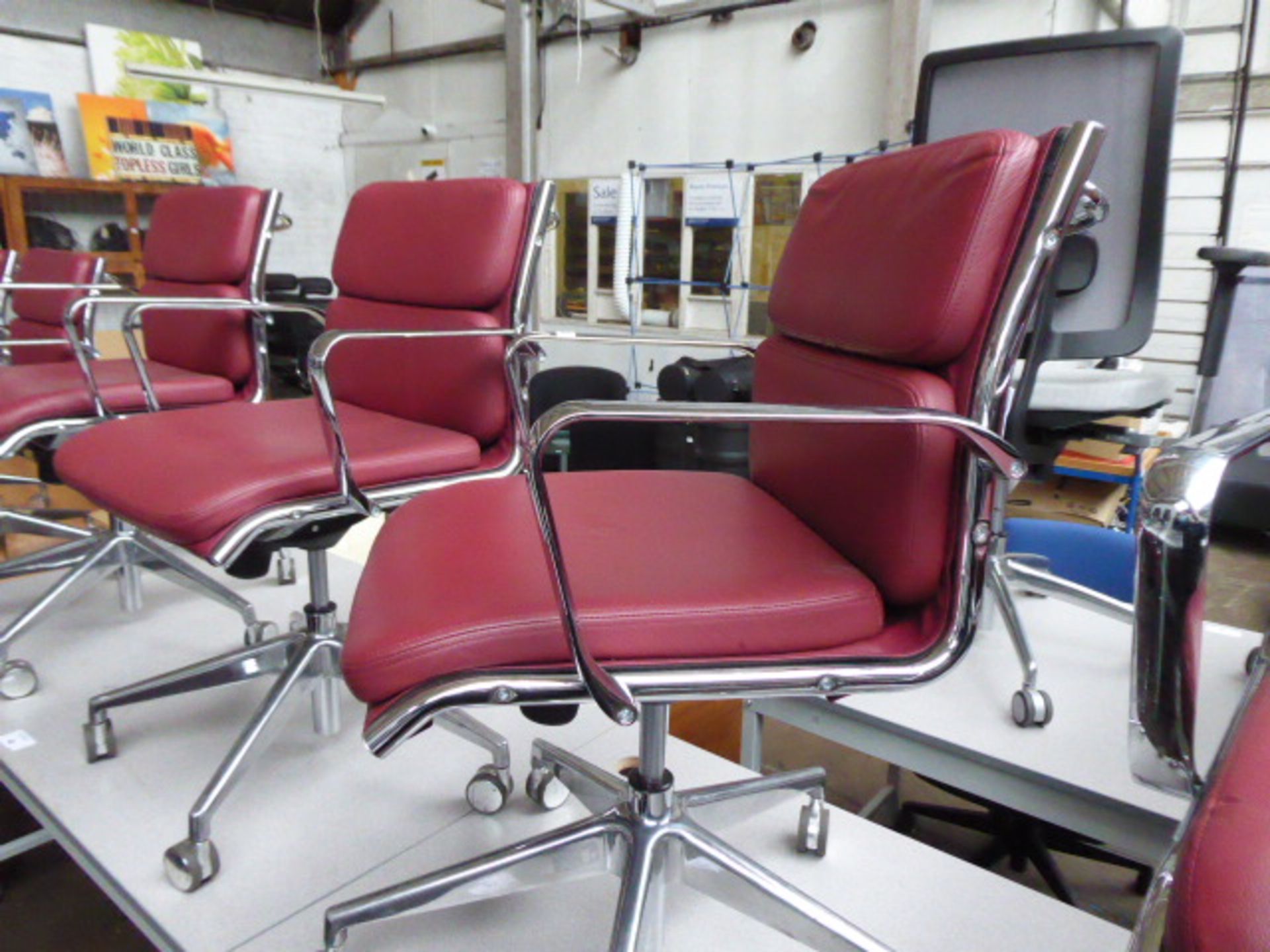 4 Milani Charles Eames style soft pad swivel armchairs in burgundy leather (4 with castors) - Image 2 of 3