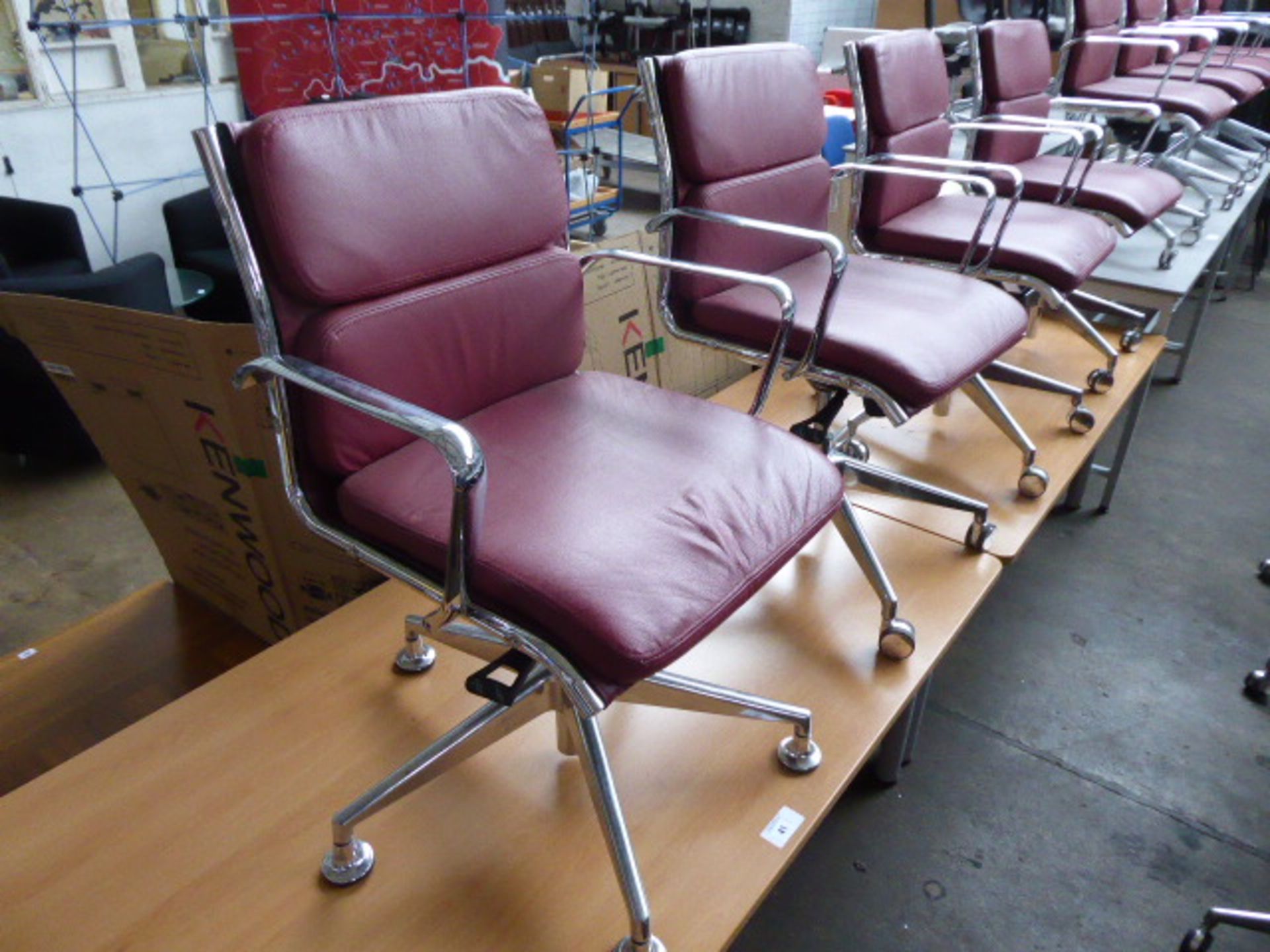 4 Milani Charles Eames style soft pad swivel armchairs in burgundy leather (3 with castors, 1 with - Image 2 of 4