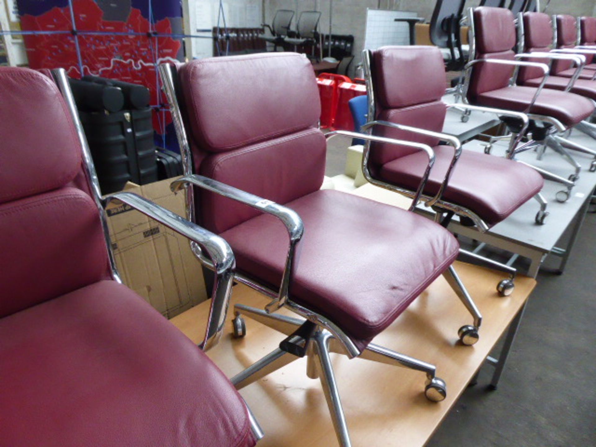 4 Milani Charles Eames style soft pad swivel armchairs in burgundy leather (3 with castors, 1 with - Image 3 of 4