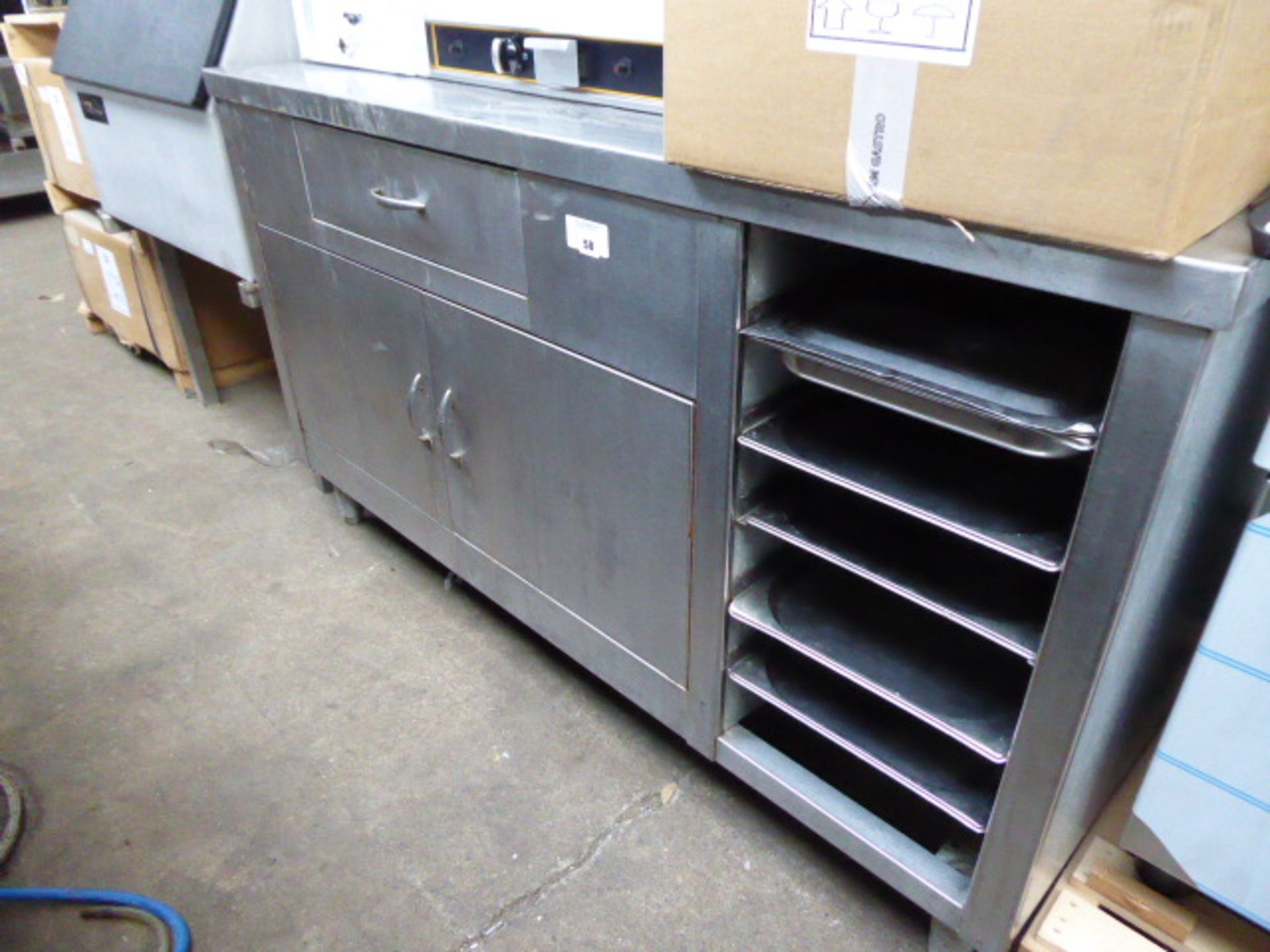 150cm stainless steel counter with drawer, 2 cupboards and space for trays under