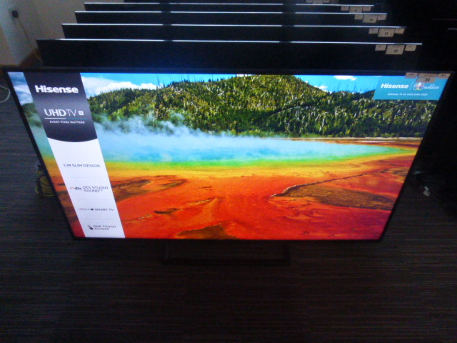 R64, 65'' Hisense 4K TV, model 65B7300UK, to include box no. B10