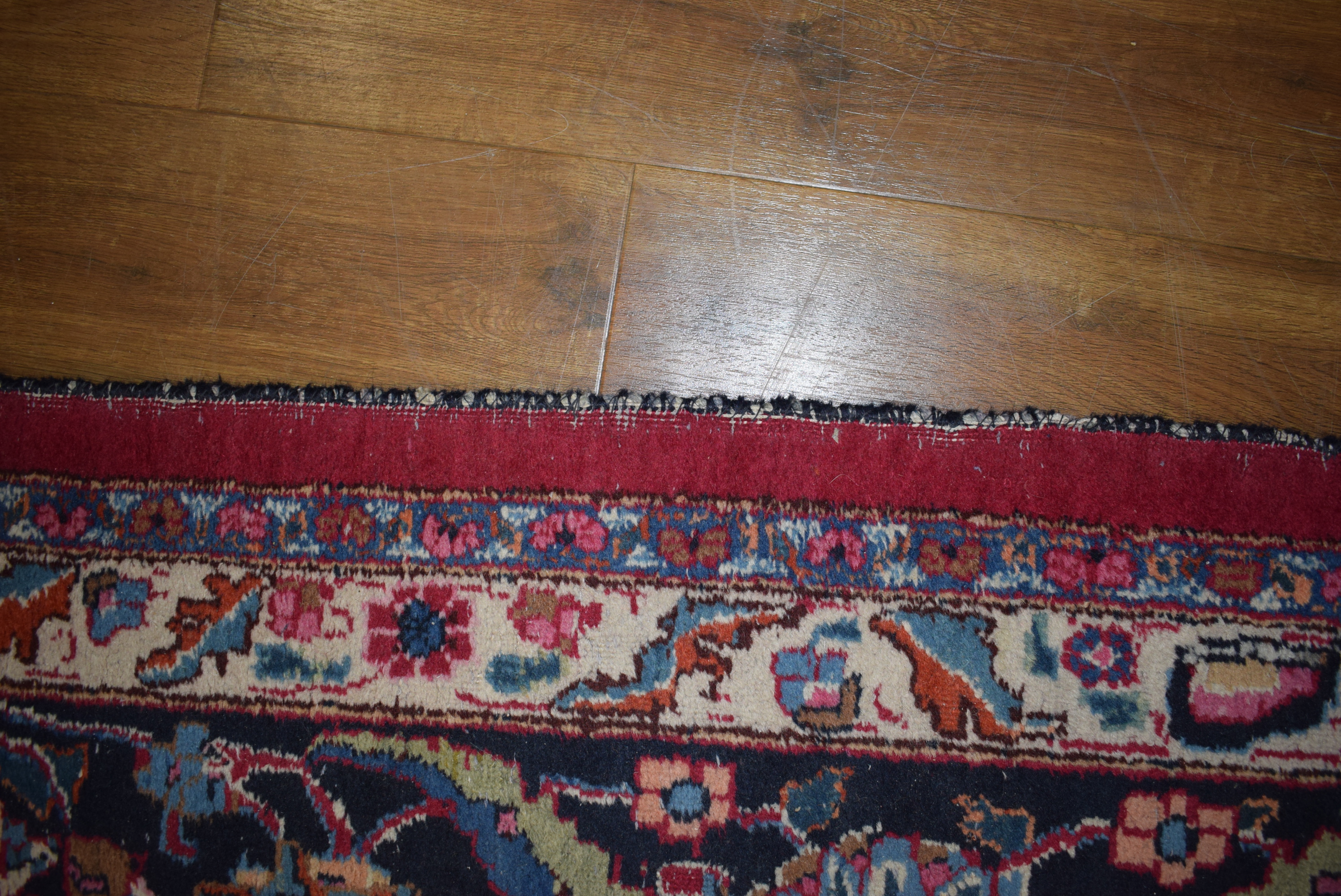 An Iranian carpet, the blue and floral ground within matching bands, - Image 5 of 7