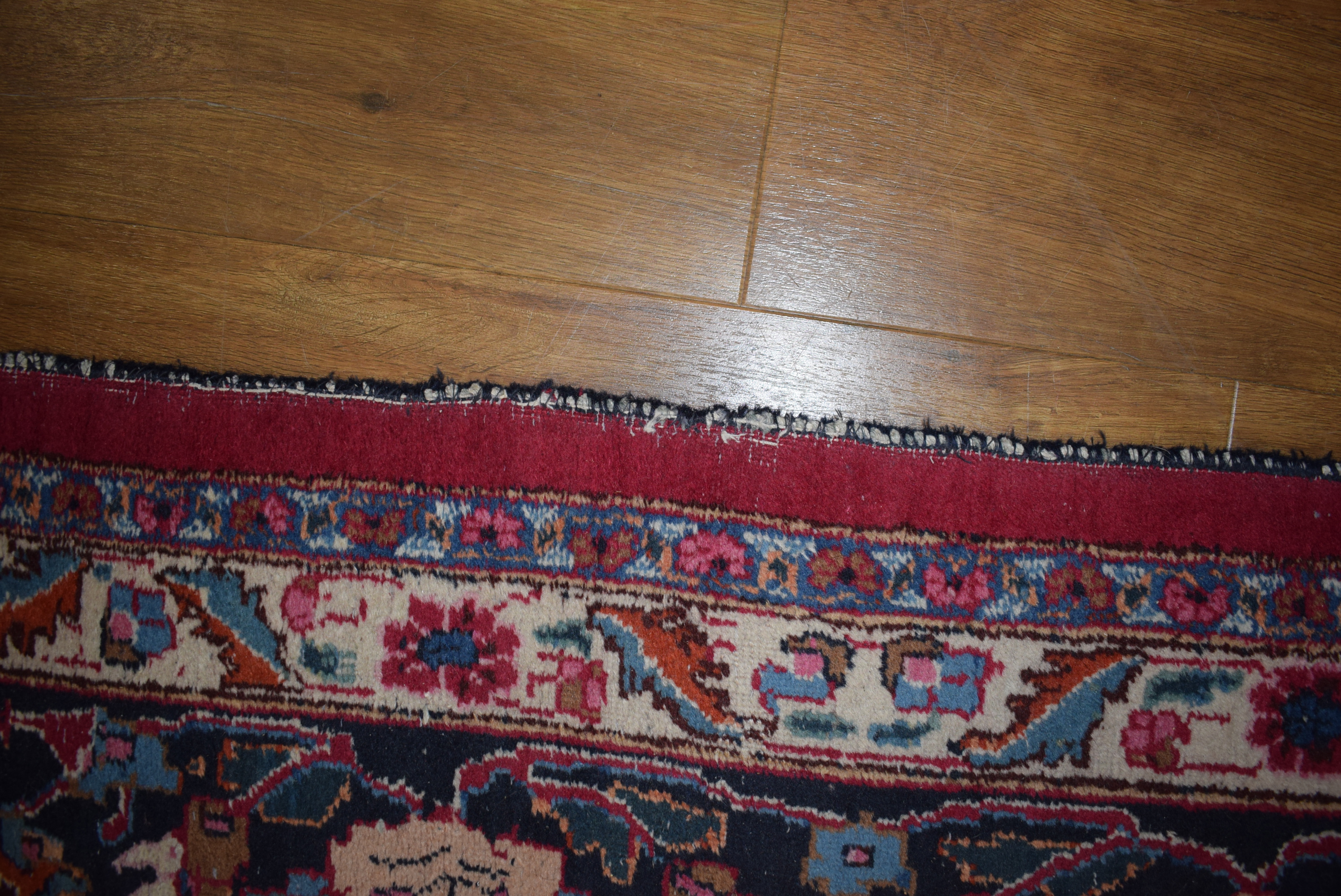 An Iranian carpet, the blue and floral ground within matching bands, - Image 4 of 7