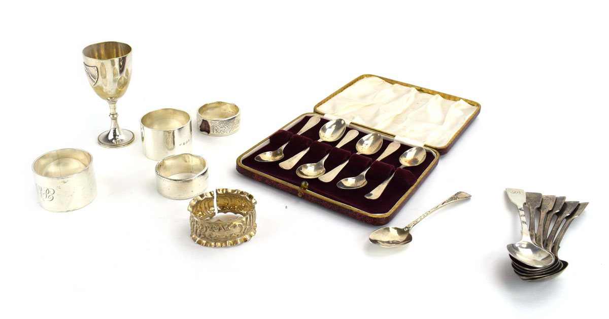 A mixed parcel of Victorian and later silver comprising five napkin rings,