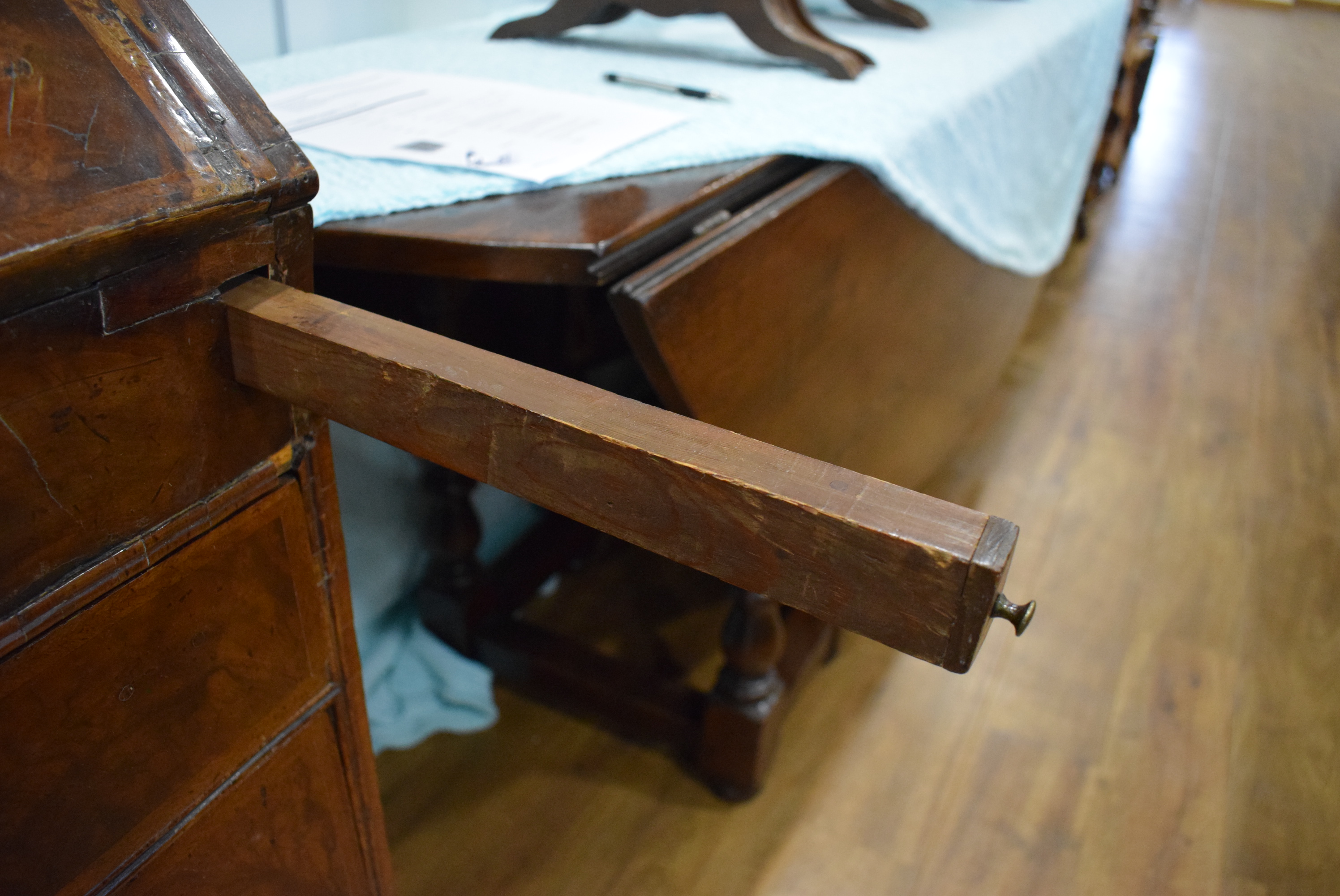 A George I/II walnut and feather crossbanded bureau, the fall front enclosing a fitted interior, - Image 23 of 55