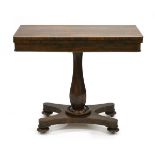 A Regency/William IV rosewood card table on a turned column with a platform base and bun feet, w.