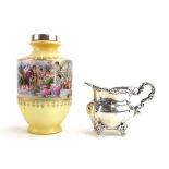 A late 19th/early 20th century Austro-Hungarian miniature metalware cream jug in the Rococo manner,