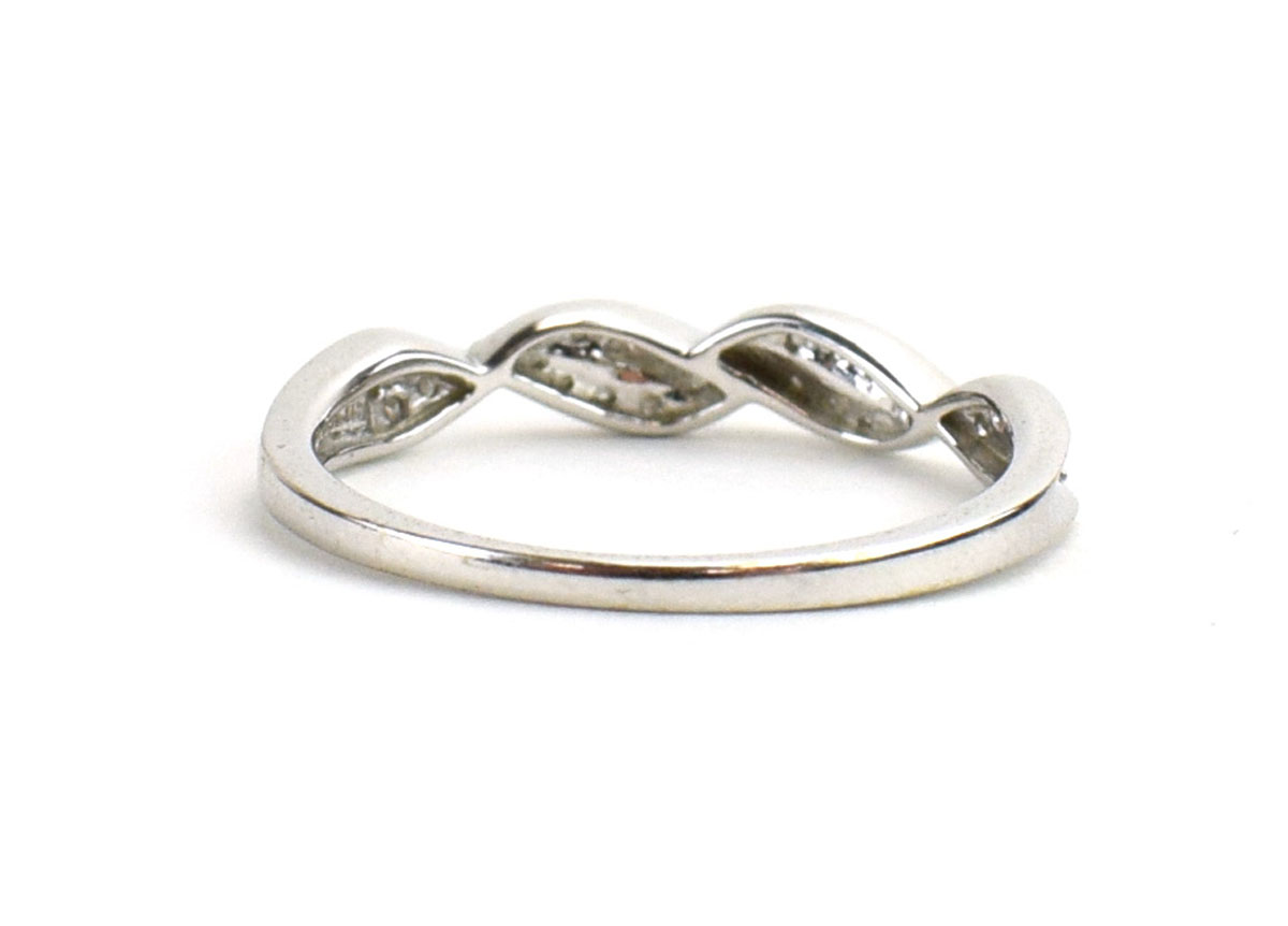 A 9ct white gold ring set small diamonds in a twist setting by Jacques Christie, ring size S, 2. - Image 3 of 3