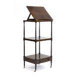 A Regency rosewood what-not, the rising writing/reading top over two tiers with a lower drawer,