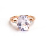 A 9ct rose gold ring set oval lavender quartz and two small diamonds, ring size Q, 3.