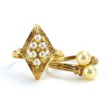 A 9ct yellow gold crossover ring set two cultured pearls,