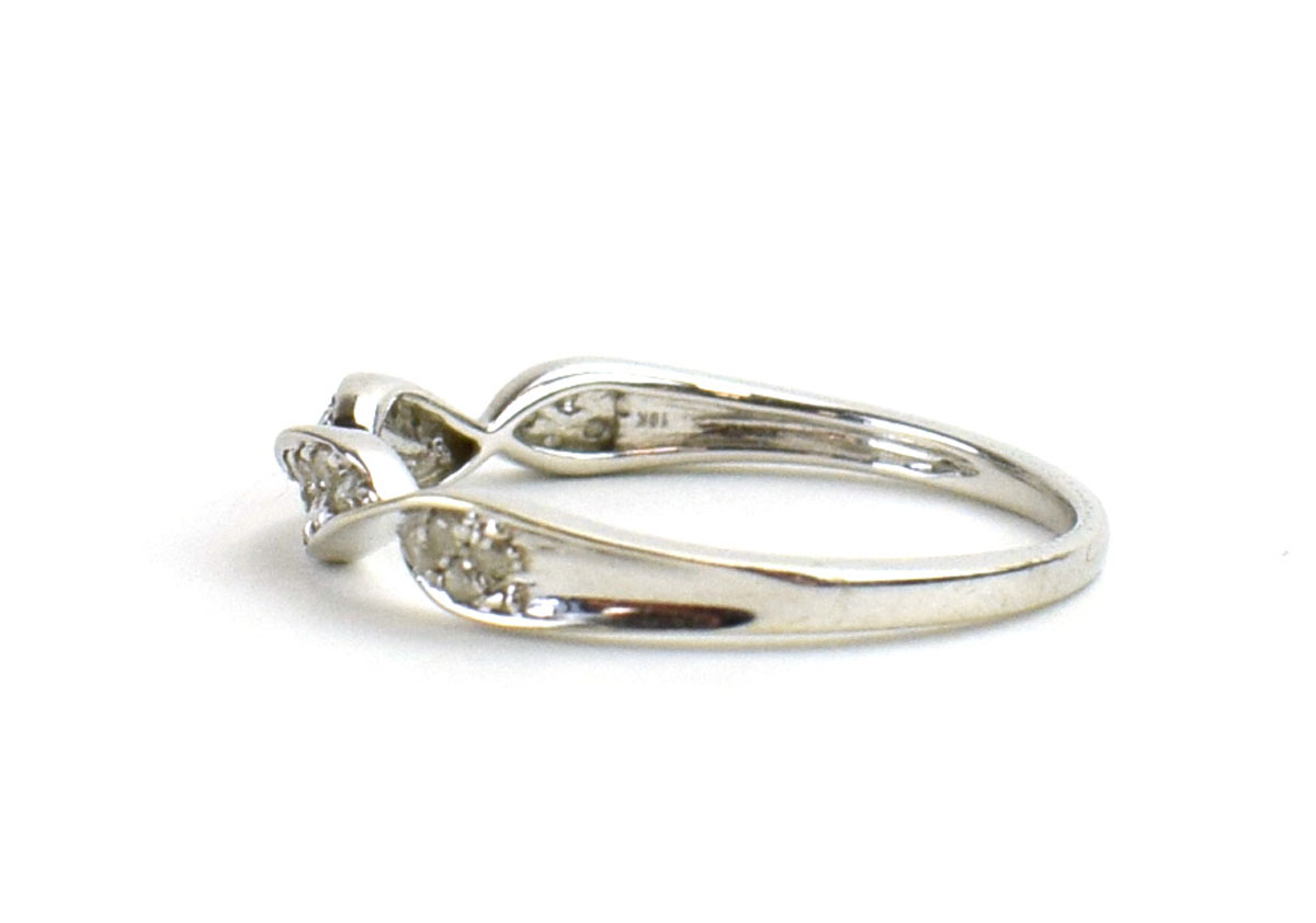 A 9ct white gold ring set small diamonds in a twist setting by Jacques Christie, ring size S, 2. - Image 2 of 3