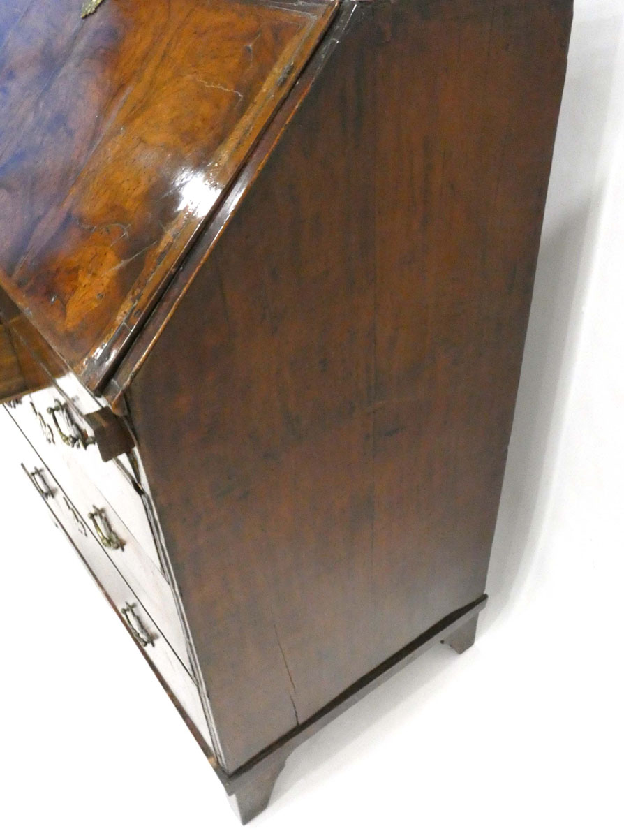 A George I/II walnut and feather crossbanded bureau, the fall front enclosing a fitted interior, - Image 7 of 55