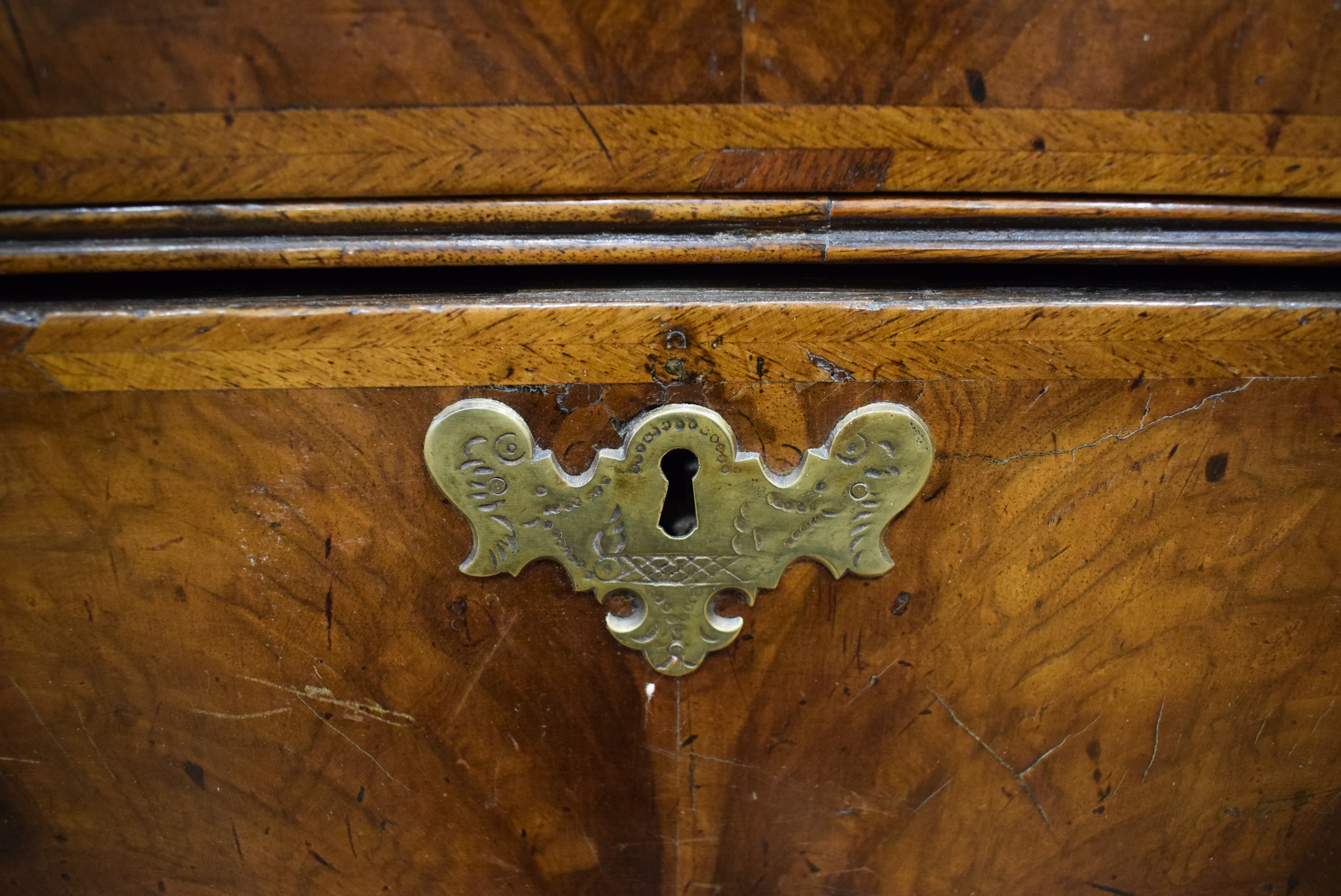 A George I/II walnut and feather crossbanded bureau, the fall front enclosing a fitted interior, - Image 36 of 55