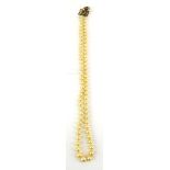 A single strand graduated cultured pearl necklace with 9ct yellow gold clasp set small pearls and