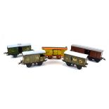 Twenty items of Hornby O gauge rolling stock, mostly vans,