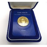 A Franklin Mint Cook Island one hundred dollar gold proof coin, dated 1979, 9.