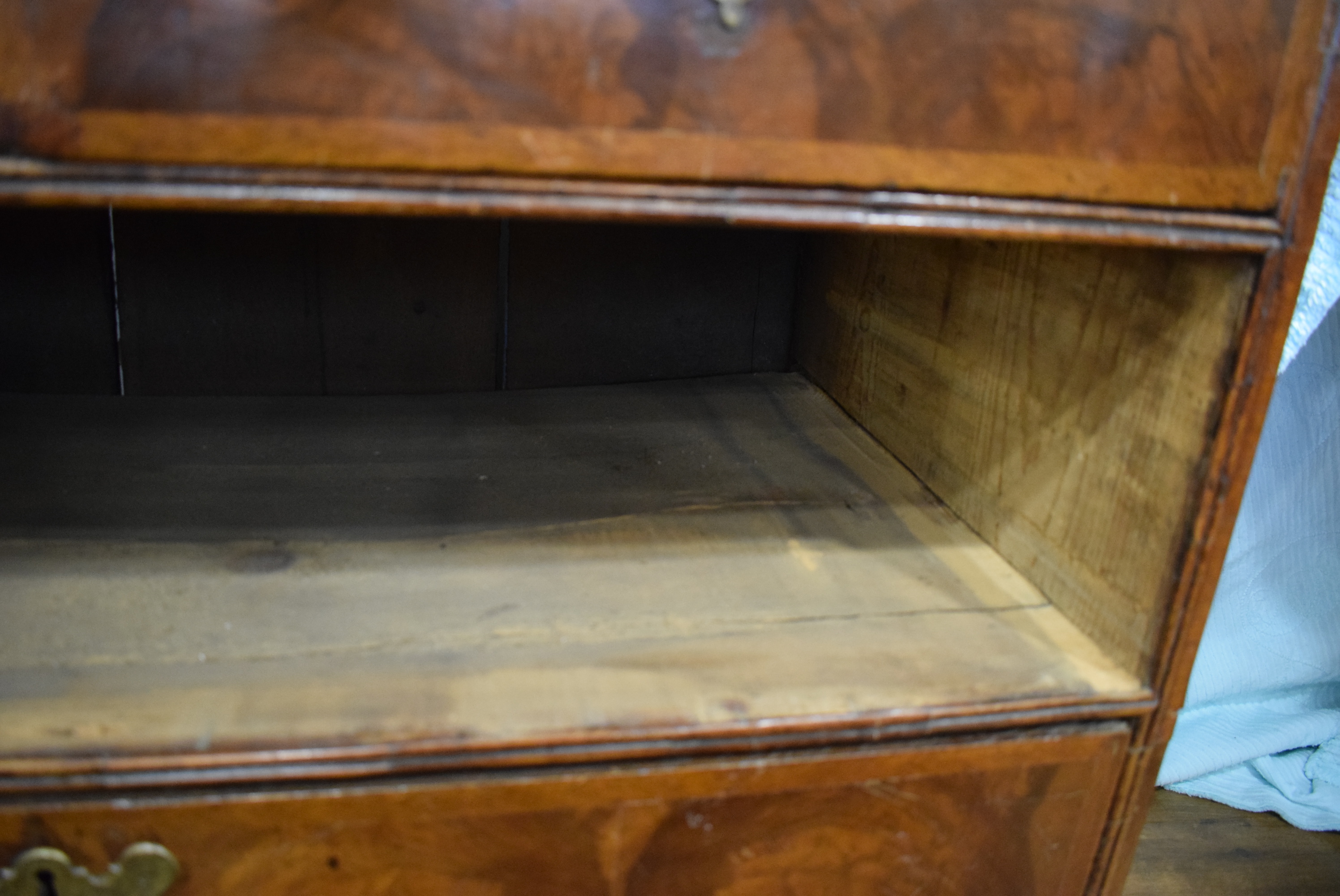 A George I/II walnut and feather crossbanded bureau, the fall front enclosing a fitted interior, - Image 50 of 55