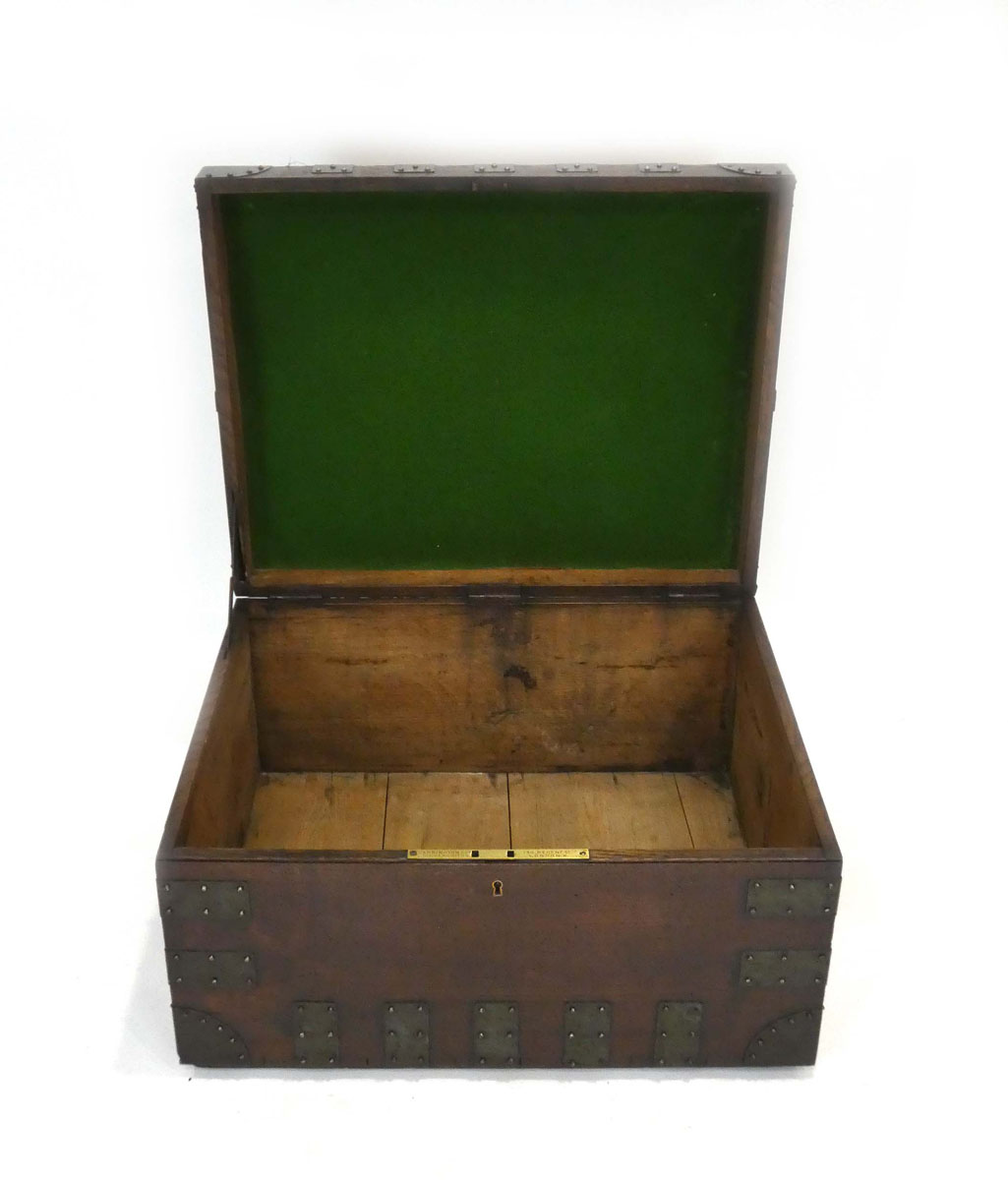 A 19th century oak and bound silver chest with later leatherwork, bearing a royal crest, w. - Image 5 of 6
