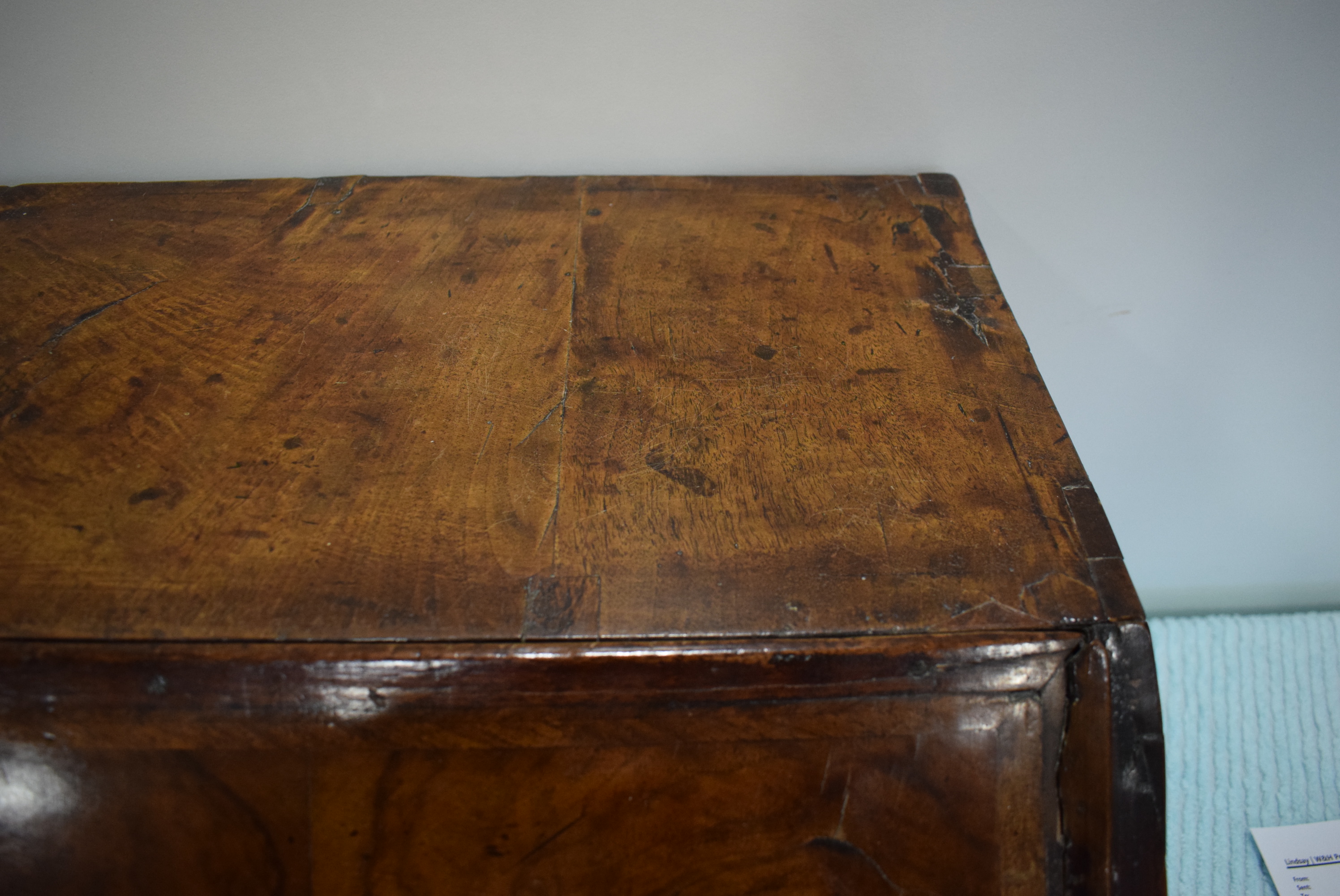 A George I/II walnut and feather crossbanded bureau, the fall front enclosing a fitted interior, - Image 32 of 55