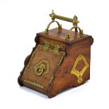A Victorian oak and brass mounted coal scuttle of Gothic form, w.