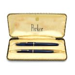 A Parker blue fountain pen with a 14ct gold nib,