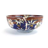 A 19th century Japanese Imari bowl decorated with stylised dragons and bamboo, d.