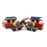 Thirty-eight items of Hornby O gauge rolling stock including cable wagons, flat trucks and others,