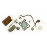 A mixed parcel of silver comprising a small wallet, a miniature photograph frame, a watch chain,