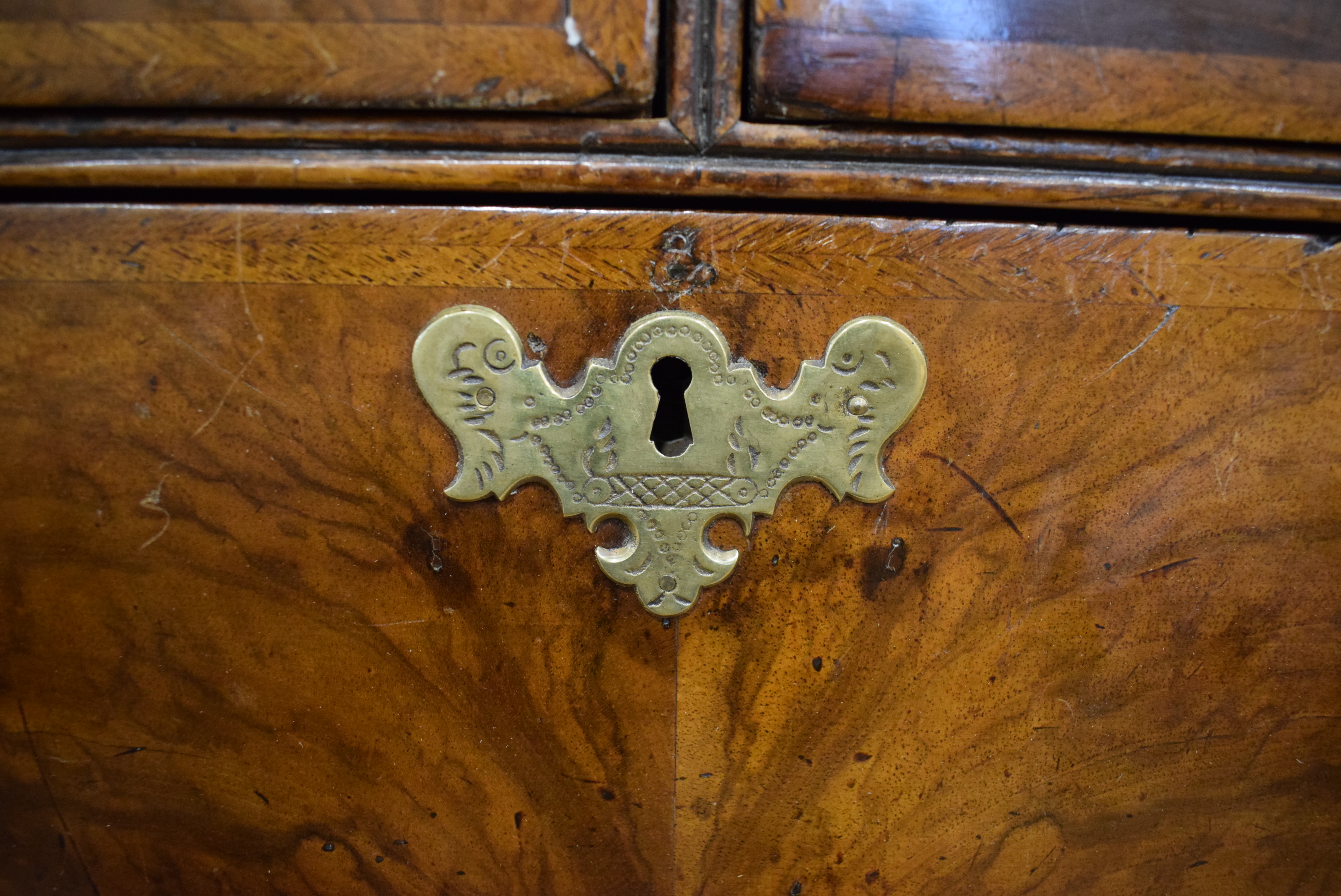 A George I/II walnut and feather crossbanded bureau, the fall front enclosing a fitted interior, - Image 39 of 55