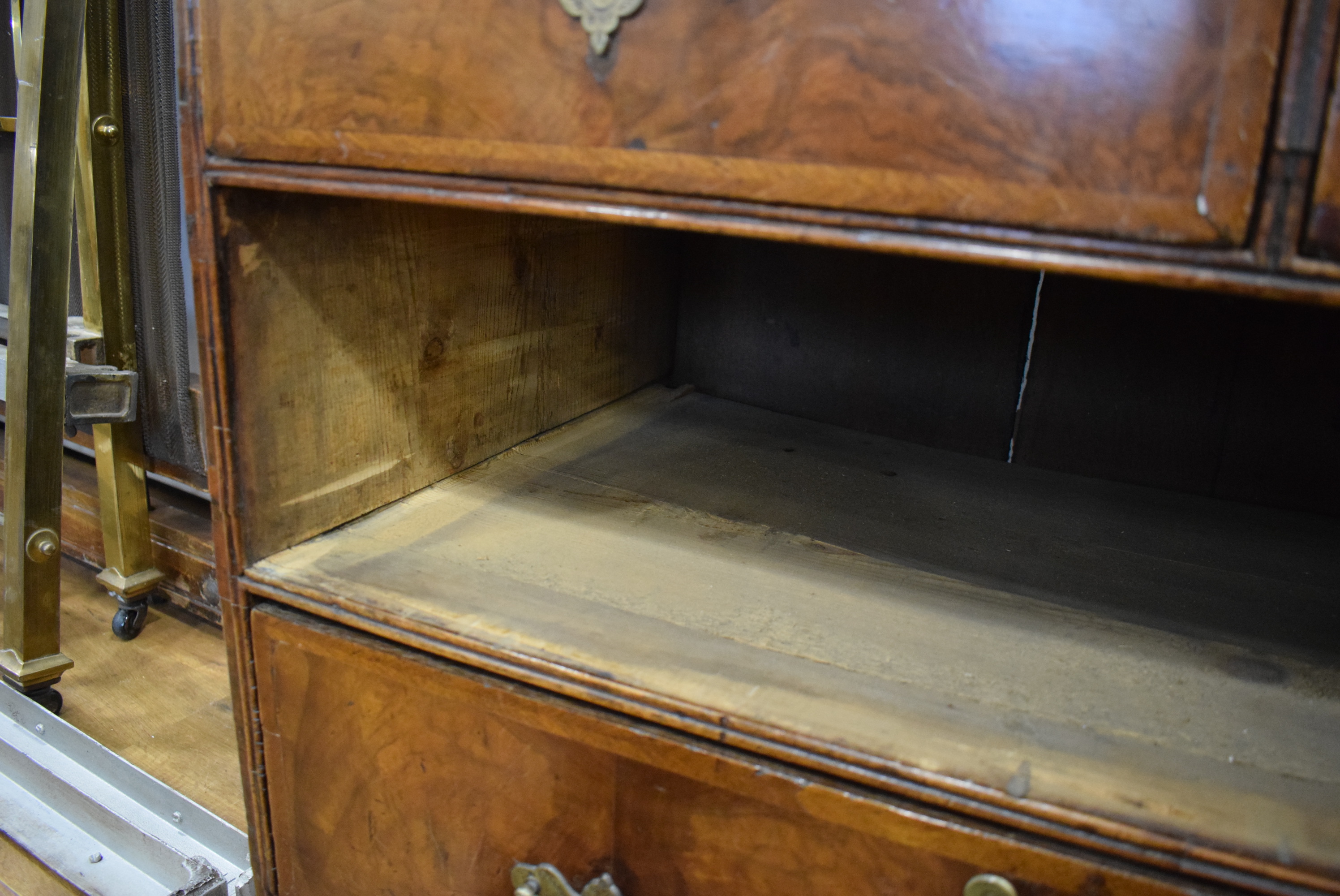 A George I/II walnut and feather crossbanded bureau, the fall front enclosing a fitted interior, - Image 51 of 55