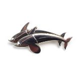 A Georg Jensen silver brooch in the form of a pair of dolphins, model no. 317, l. 4.