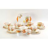 A Shelley tea service decorated in the 'Cape Gooseberry' pattern, 12299, including a jug, bowl,