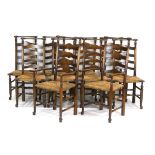 A set of ten 18th century style oak and ash dining chairs with seagrass seats,