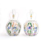 A pair of 19th century Continental glass decanters of renaissance design,