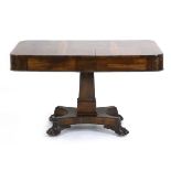 A Regency rosewood centre/side table with rounded edges, two frieze drawers,