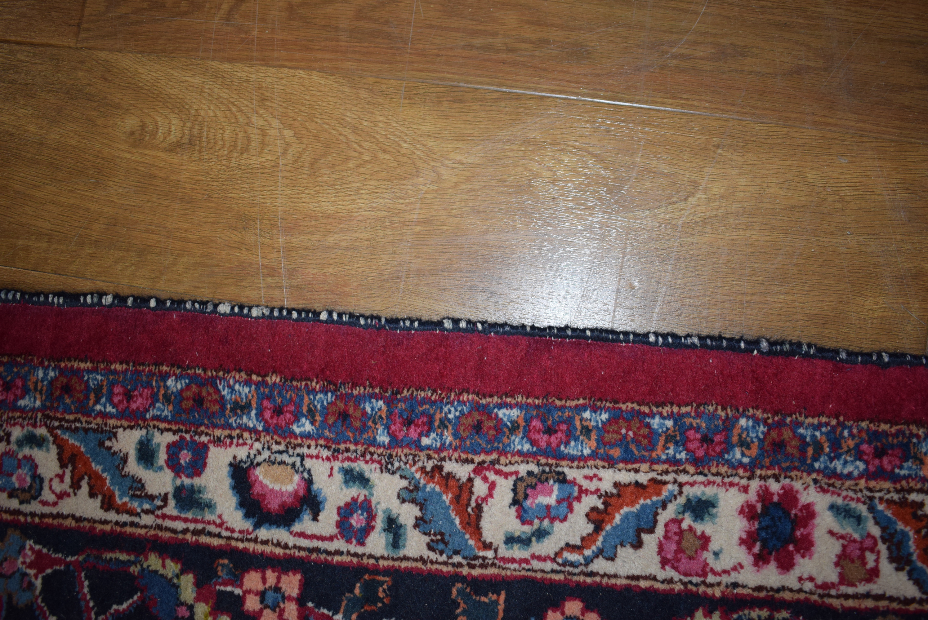 An Iranian carpet, the blue and floral ground within matching bands, - Image 3 of 7