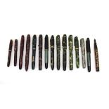 A group of fifteen fountain pens with marbled cases and 14ct gold nibs CONDITION REPORT: