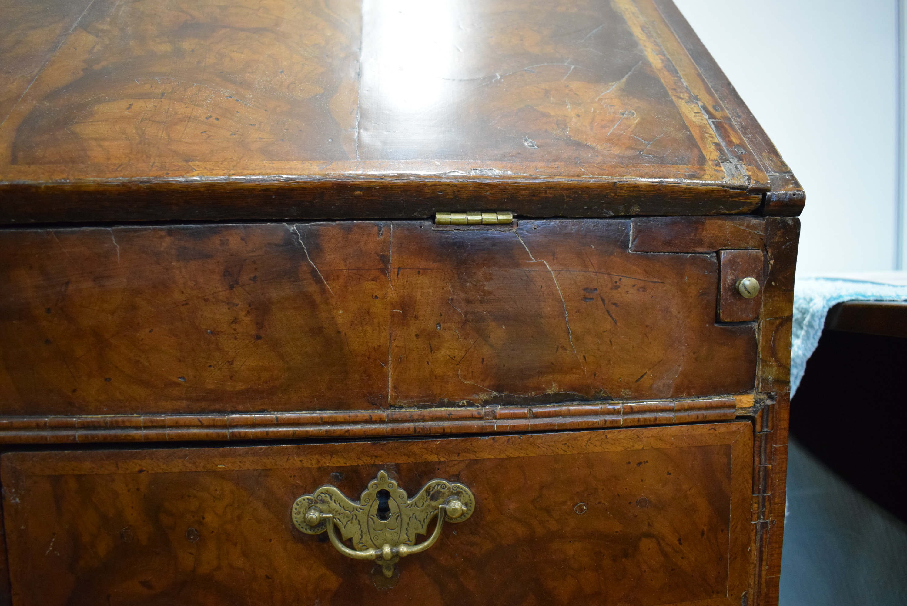 A George I/II walnut and feather crossbanded bureau, the fall front enclosing a fitted interior, - Image 21 of 55