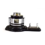 An Art Deco chromed and black barograph with a metalware's presentation plaque dated 1950,