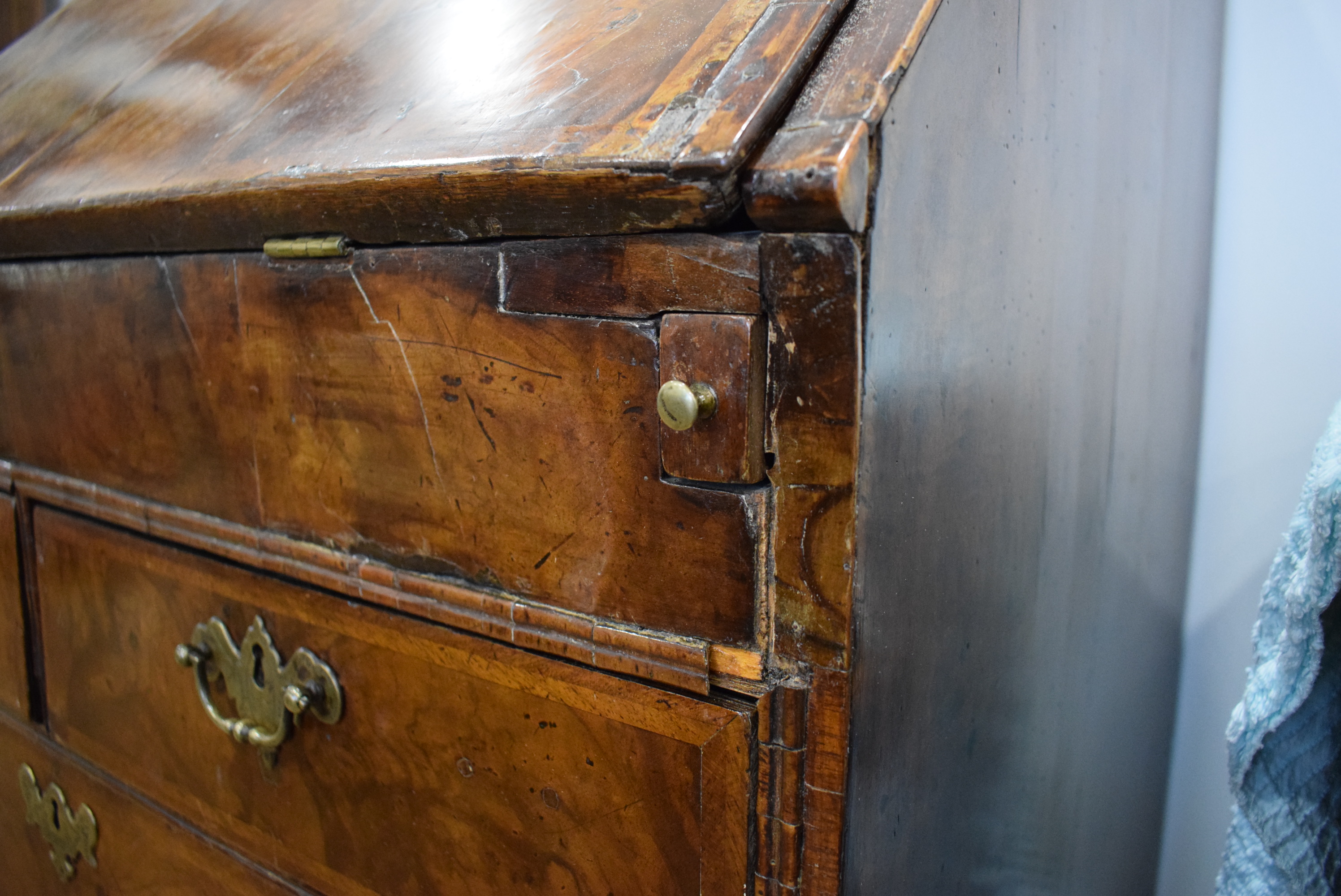 A George I/II walnut and feather crossbanded bureau, the fall front enclosing a fitted interior, - Image 17 of 55